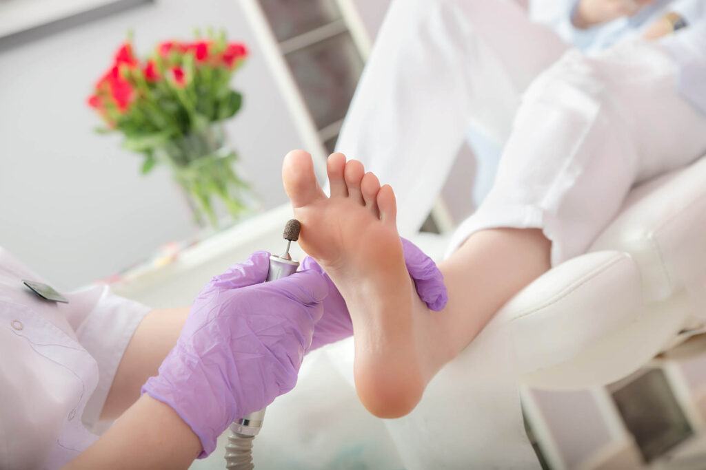 Pedicure,Spa,Procedure,In,The,Beauty,Salon.,Peeling,Feet.,Electric